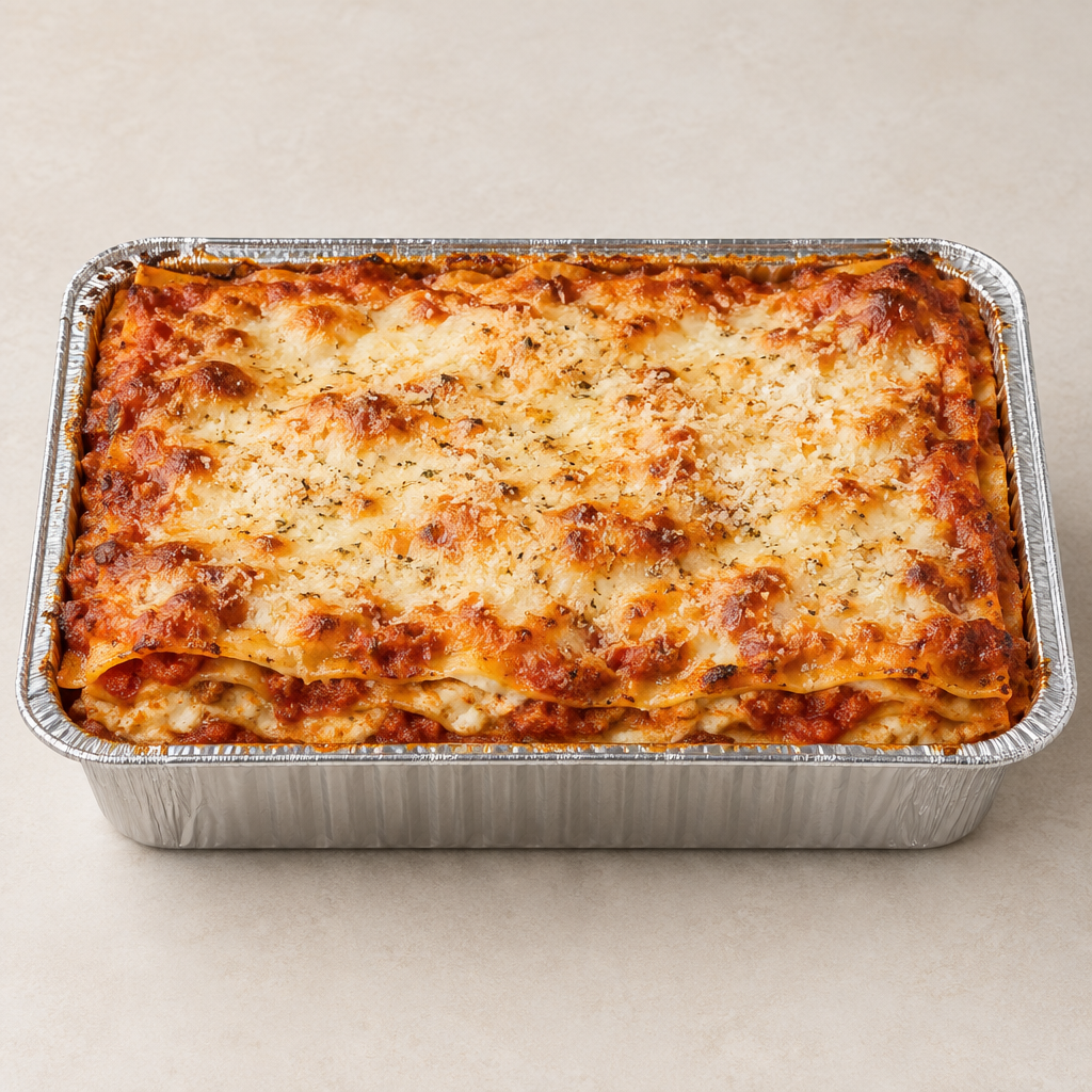 Classic baked lasagna in a narrow 9-inch foil pan
